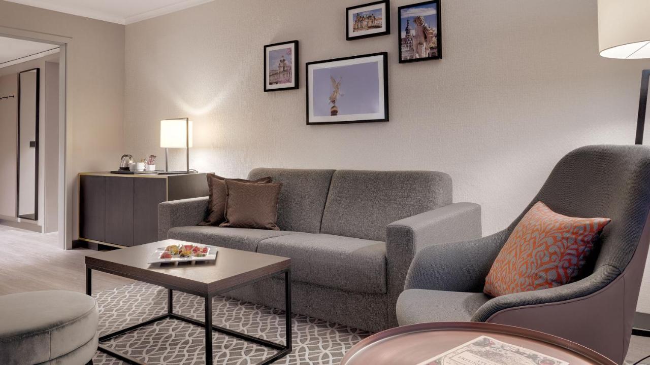 Bilderberg Bellevue Hotel Dresden Exterior photo A living room in a typical hotel suite